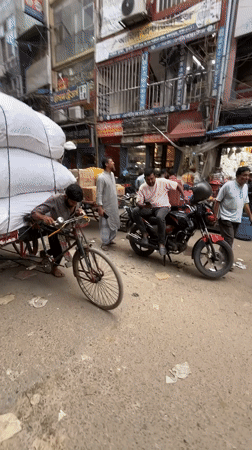 Morning street commerce activity documented across Dhaka