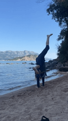 Tourists enjoy beach activities in Budva, Montenegro