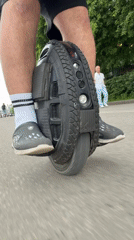 Electric unicycle rider travels through diverse Moscow terrain