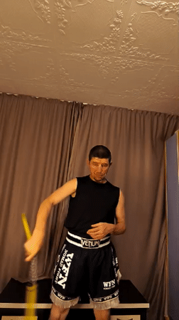 Kitten on yellow fabric and nunchaku practice in Karaganda