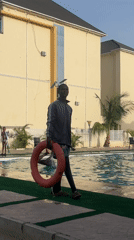 Young men enjoy afternoon pool party in Barakin Lerawi