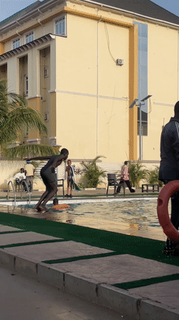 Young men enjoy afternoon pool party in Barakin Lerawi