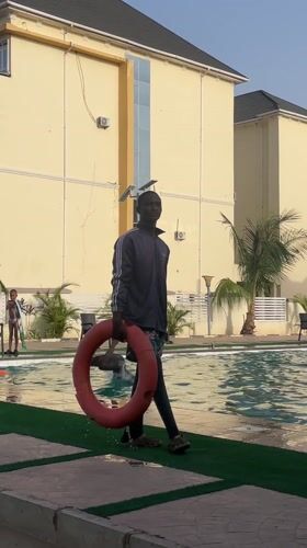 Young men enjoy afternoon pool party in Barakin Lerawi