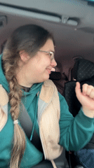 Woman records car journey on snowy Russian road