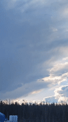 Sky clears from gray to blue over Russia