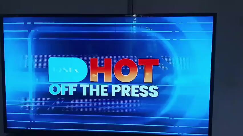The video begins with a bright blue screen displaying the text "DSGN HOT OFF THE PRESS" with a grid-like pattern in the background. The screen then transitions to a bright blue background with a rounded rectangle in the center. Inside the rectangle, the words "What to watch THIS MONTH" are displayed in large white letters. The video then shows a collage of images. The first image is of a man's face, possibly an actor, with several other faces in the background, some of them shouting. The second image is of a man's face with a gray beard, and several other men in suits are visible behind him. The video appears to be a promotional segment for a television channel or streaming service, highlighting upcoming content for the month. The overall aesthetic is modern and dynamic, with a focus on bold text and striking imagery.
