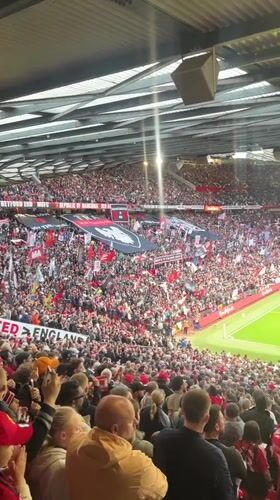 Packed Old Trafford crowd shows support during soccer match