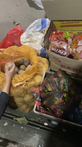 Fresh produce and dry goods at a local Aneuk Paya market