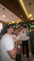 Young adults celebrate at Puebla bar in early morning gathering