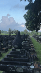 Indonesian temple complex and traditional graveyard documented by witnesses