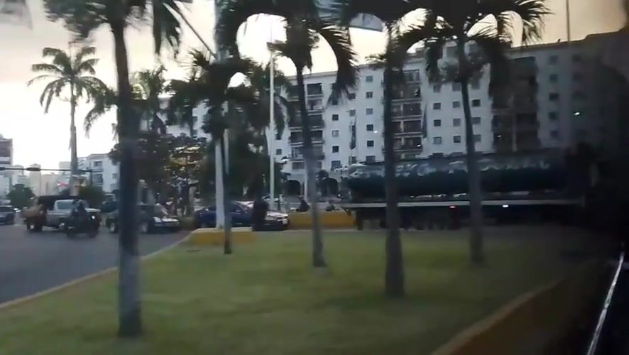 Evening street scenes captured from moving vehicle in Caracas