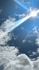 Bright sun and shifting clouds over Gatineau at midday