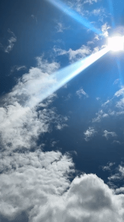 Bright sun and shifting clouds over Gatineau at midday