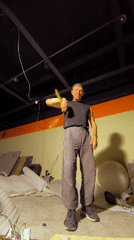 Flow arts practice in a raw, unfinished Karaganda space