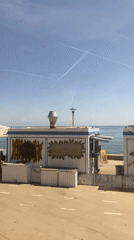 Sunny coastal drive captured along Badalona promenade