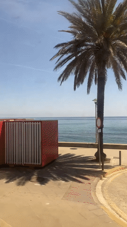 Sunny coastal drive captured along Badalona promenade