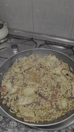 Evening pasta cooking captured in Cornellà de Llobregat kitchen