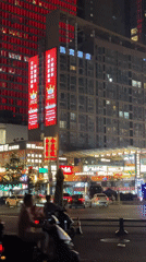 Nighttime urban activity documented in Jinjiang District intersection
