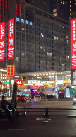 Nighttime urban activity documented in Jinjiang District intersection