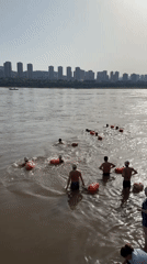 Morning leisure activities observed along Jiangjin riverside park