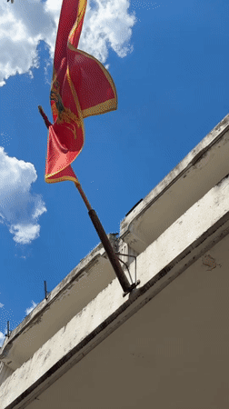 Tourist documents casual walking tour through Budva Montenegro streets