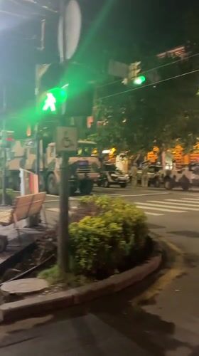 Military vehicles, soldiers observed at Yerevan intersection at night