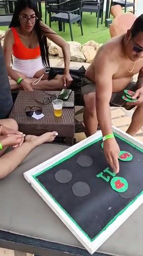 Resort guests enjoy games and pool activities in Porlamar