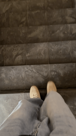 Person photographs self on staircase in Yekaterinburg