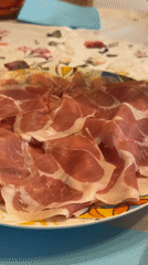 Milan home evening: charcuterie, wine, chocolate, and cats