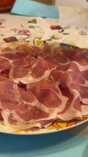 Milan home evening: charcuterie, wine, chocolate, and cats