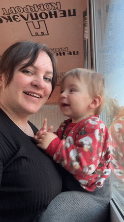 Mother and toddler share tender moments in Noviy, Russia