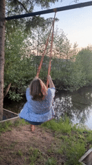 Outdoor gathering with rope swing celebration in Markovo, Russia