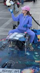 Street artist creates spray paint art in Saint Petersburg square