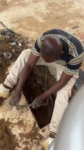 Hands-on utility work underway at a dig site in Barakin Lerawi