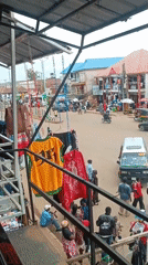 Bustling Nigerian marketplace documented during midday trading hours