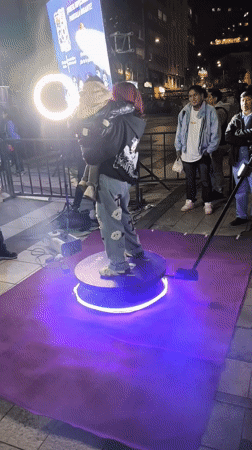 Nighttime street parade with marching bands draws crowds in La Paz