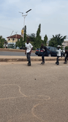Young people roller skate through Jos city streets