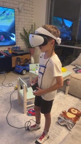 Family gaming and grilling activities documented in Netanya home