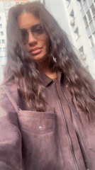 Woman records selfie videos on street in Krasnogorsk