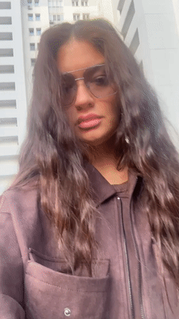 Woman records selfie videos on street in Krasnogorsk