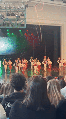 Traditional dancers perform for crowd in Burgas, Bulgaria