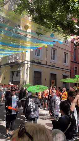 Cultural parade with kimono-clad participants fills Barcelona streets
