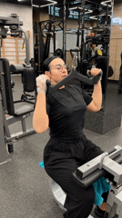 Woman completes lat pulldown workout at Saint Petersburg gym