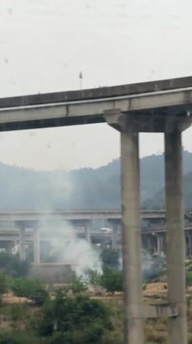 White smoke plume observed near highway overpasses in Xiaoyan