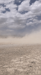 Dust devil crosses open terrain in Quetta, Pakistan