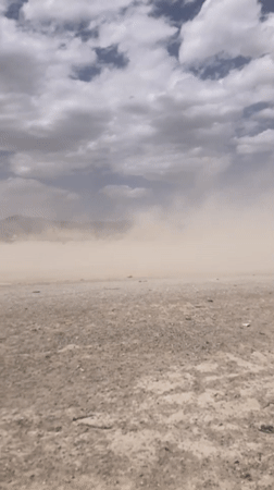 Dust devil crosses open terrain in Quetta, Pakistan