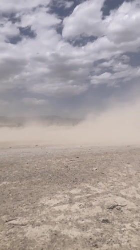 Dust devil crosses open terrain in Quetta, Pakistan