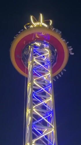 Colorful amusement park rides light up a Quetta night