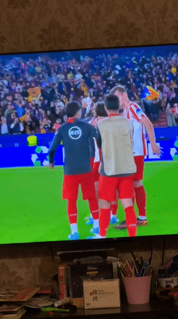 Yerevan resident watches Atletico Madrid defeat Barcelona 2-0 on TV