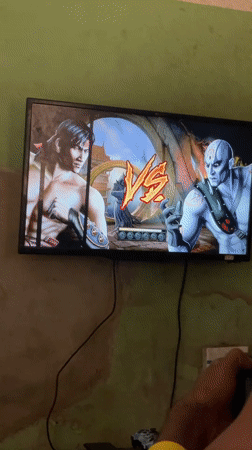 Young men play Mortal Kombat, soccer games in Akwanga